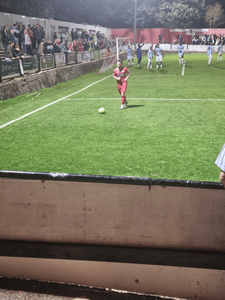 Jamie Reynolds walking toward the corner flag